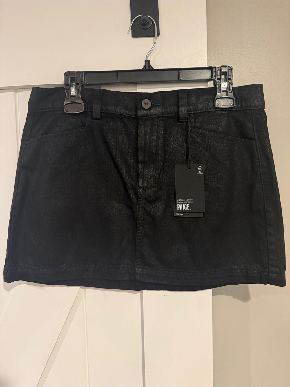 PAIGE Black Coated Mini Skirt with Front Pockets